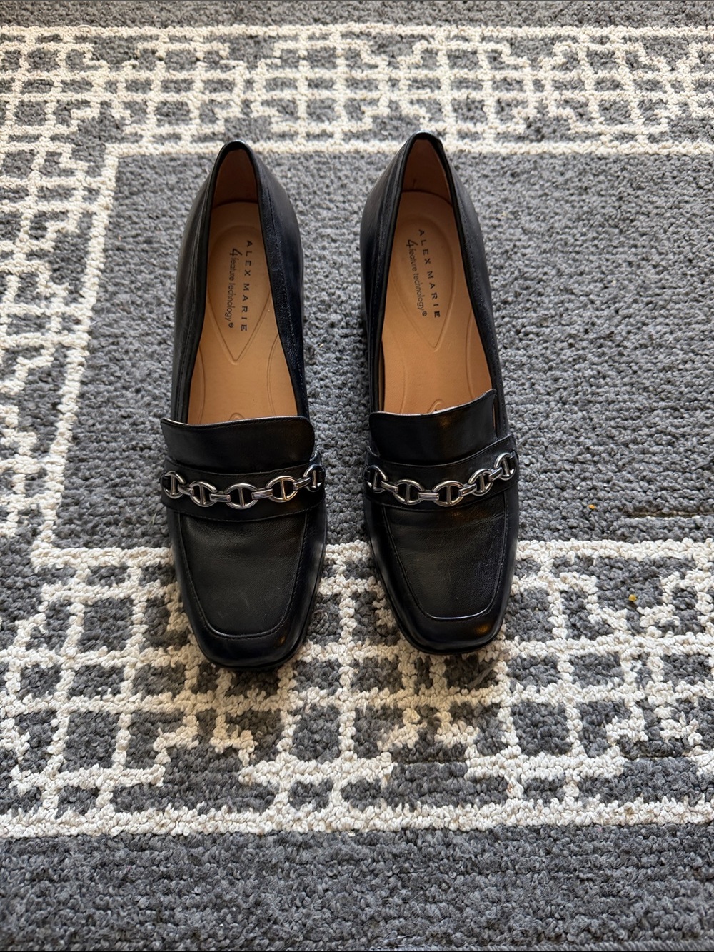 Alex Marie Black Leather Loafers with Silver Chain Detail